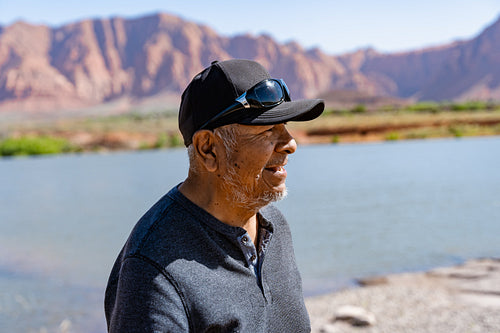 Native Elder enjoying a walk by a lake