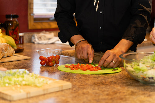 Indigenous family making a meal together