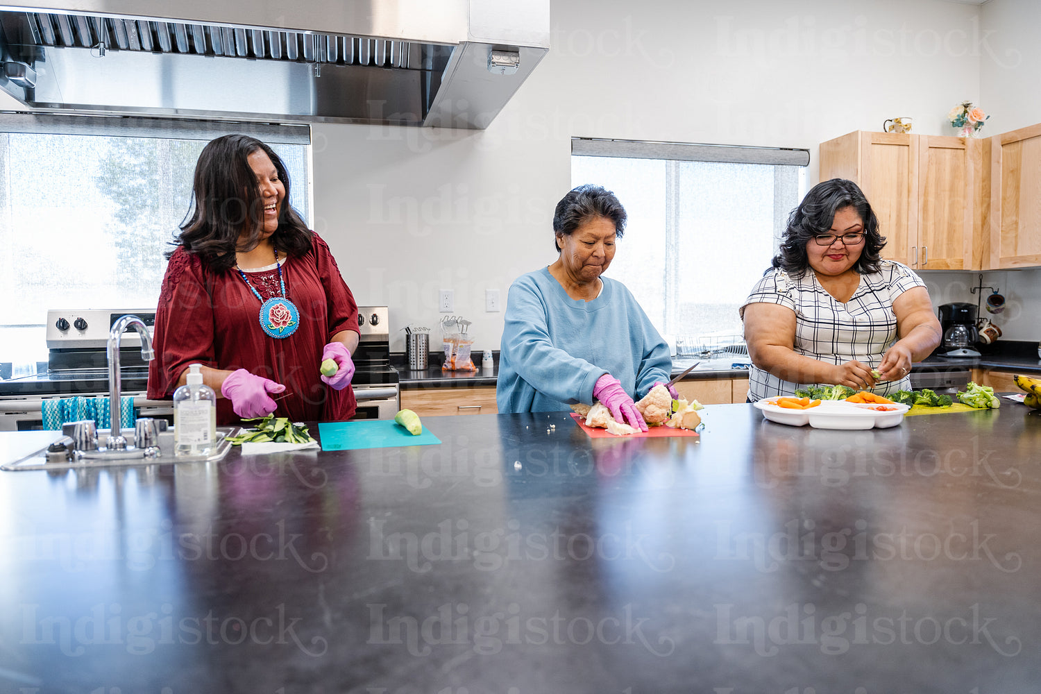 Native Peoples participating in a cooking class