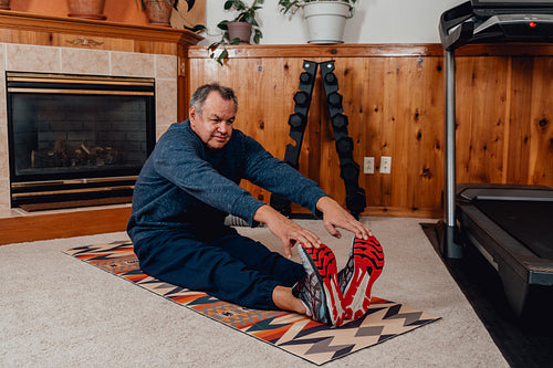 Indigenous Men working out in home gym