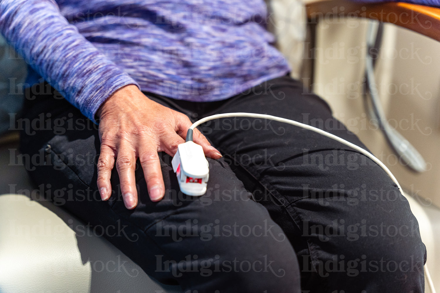 A native elder getting a health checkup at a health center 