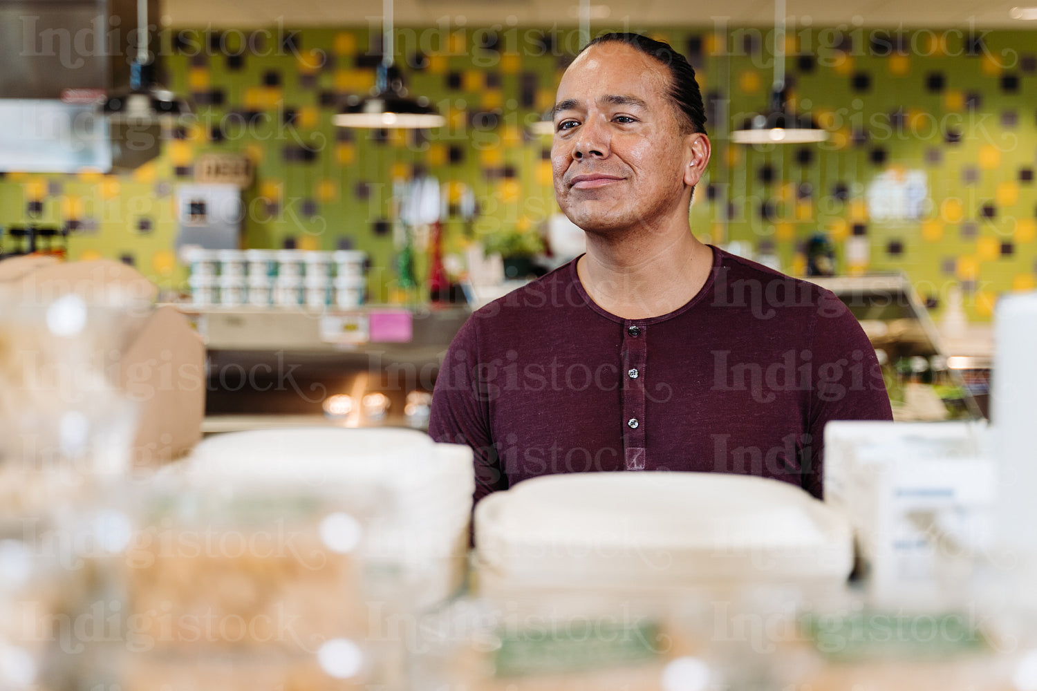 Indigenous man getting food