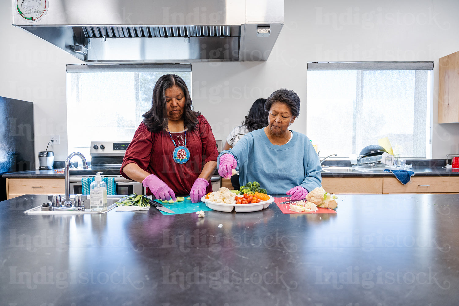 Native Peoples participating in a cooking class