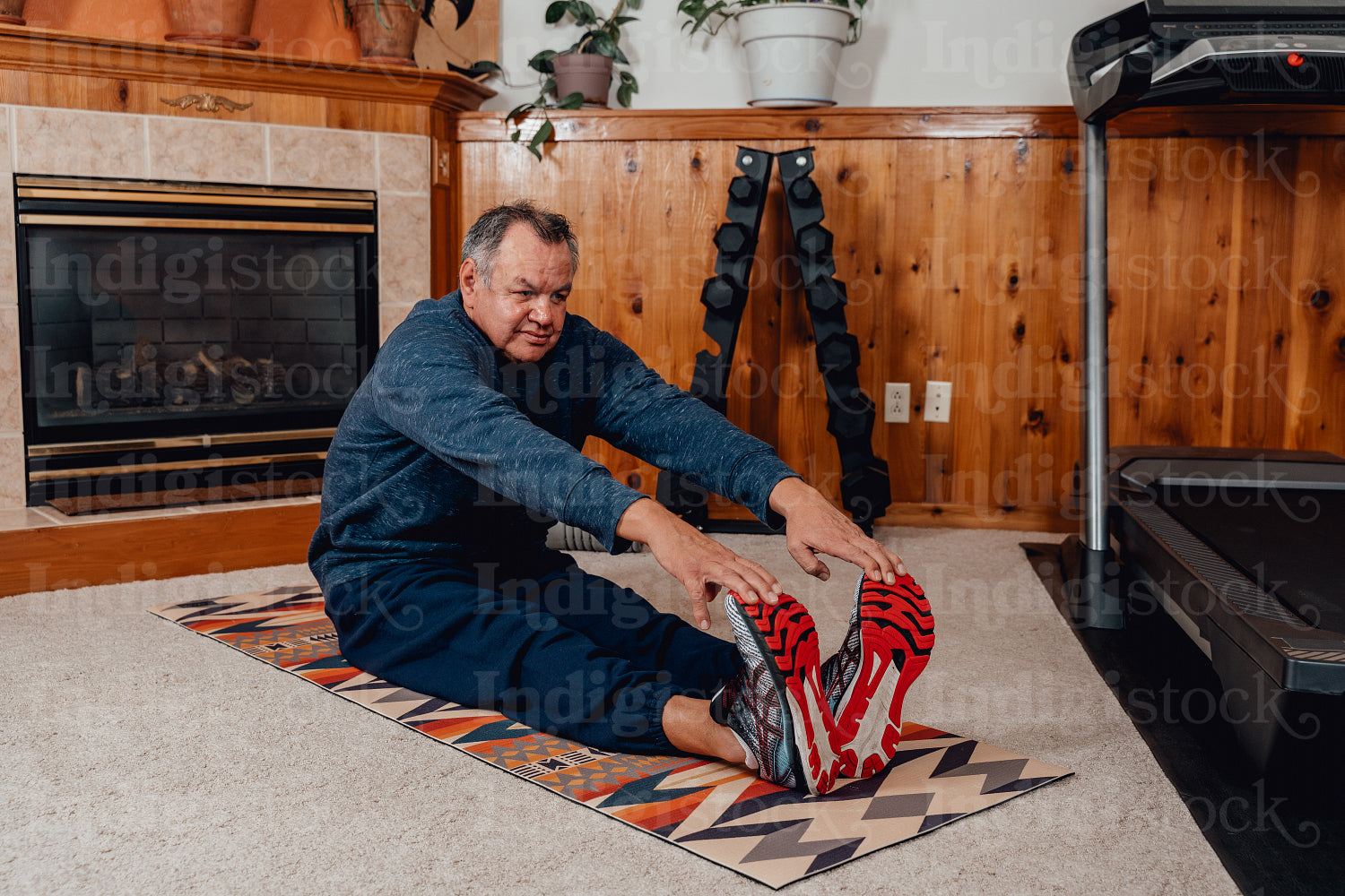 Indigenous Men working out in home gym