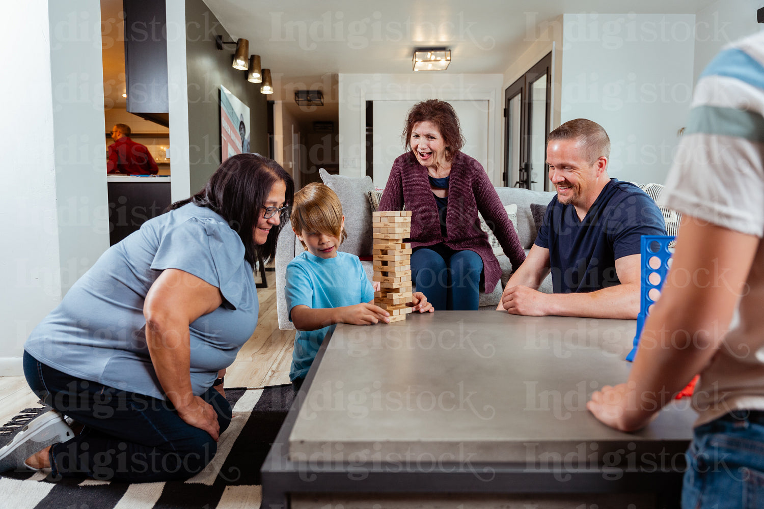 A family of Indigenous Peoples playing games together