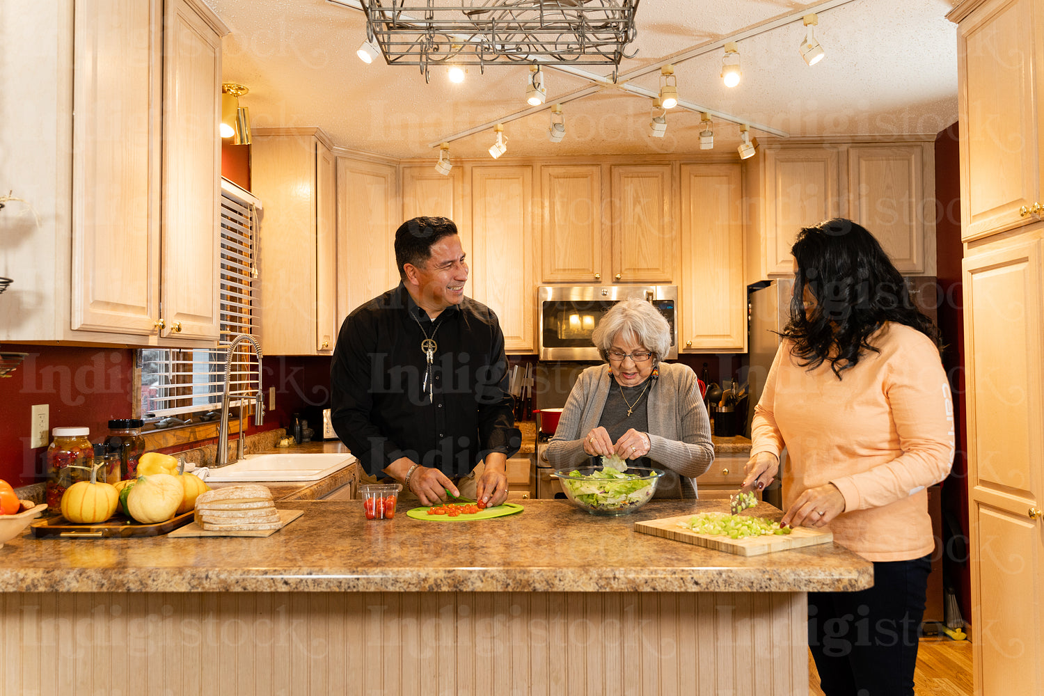 Indigenous family making supper together