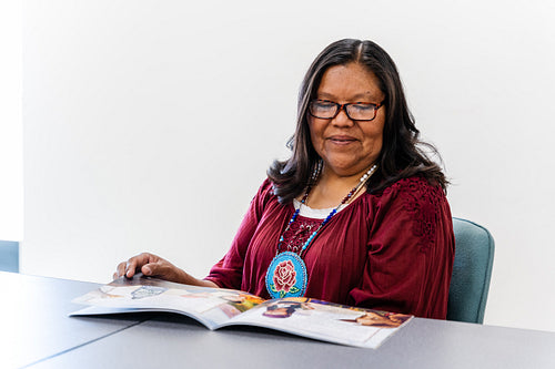 A Native woman learning about health and wellbeing