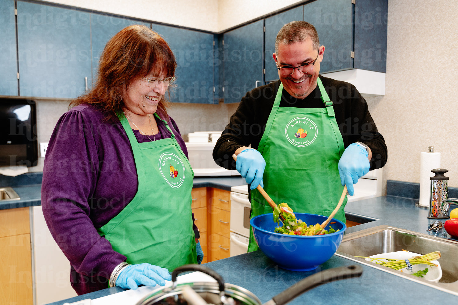 Indigenous Peoples making a meal together