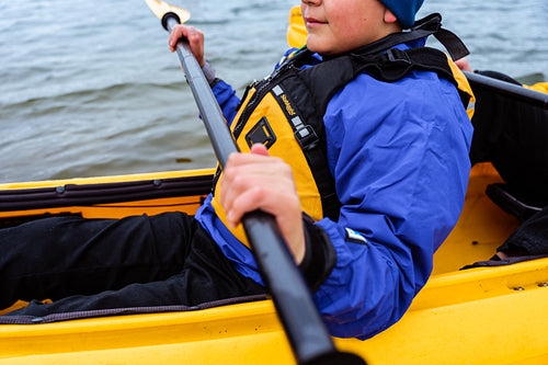 Indigenous family going kayaking