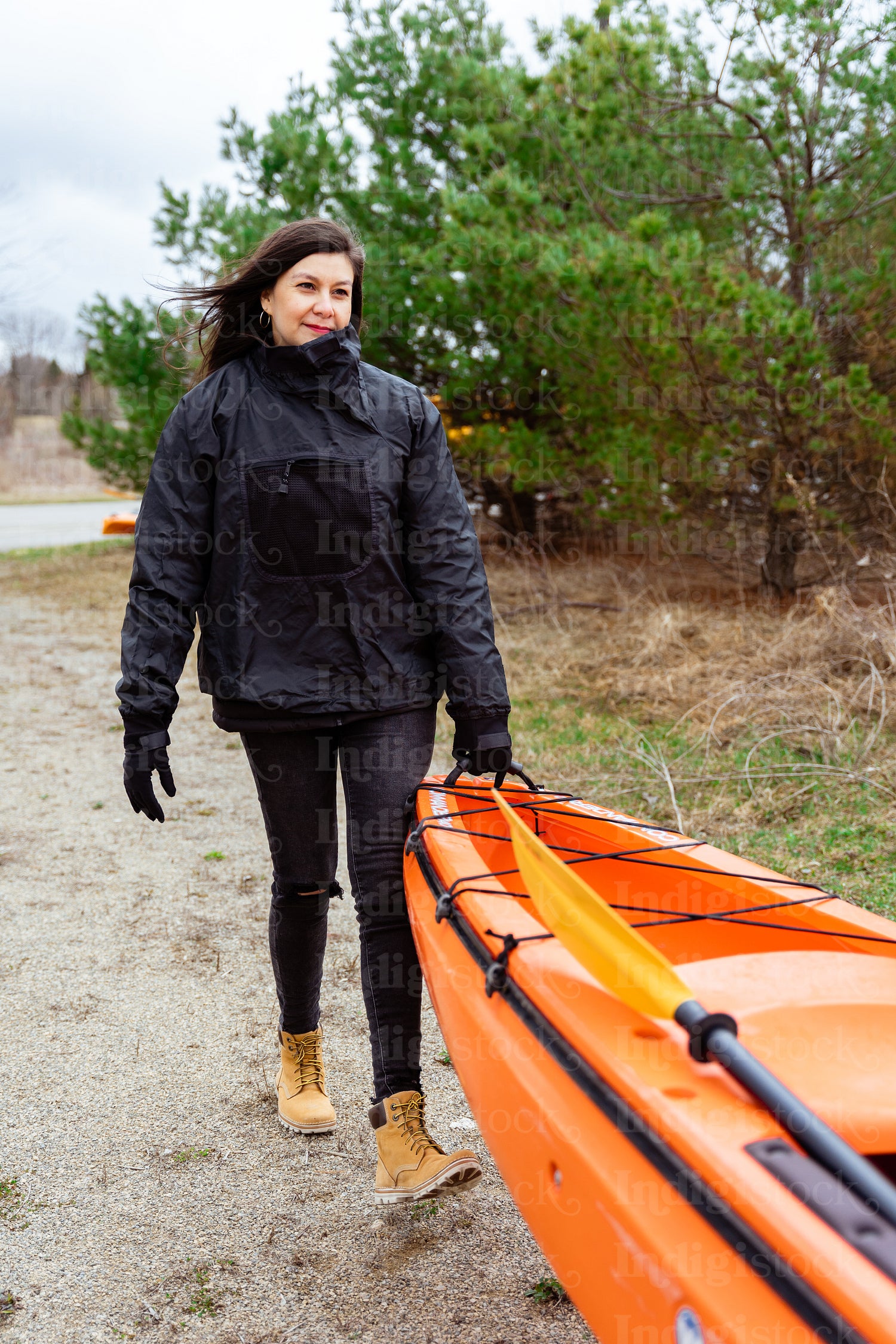 Indigenous family going kayaking 