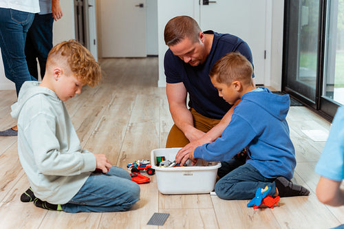 A family of Indigenous Peoples playing games together