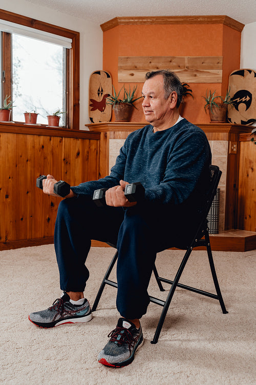 Indigenous Men working out in home gym