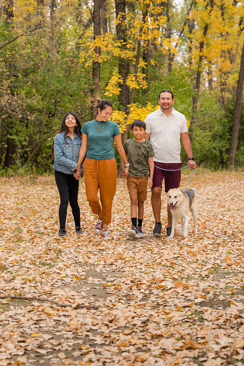 Indigenous family taking a walk in the woods