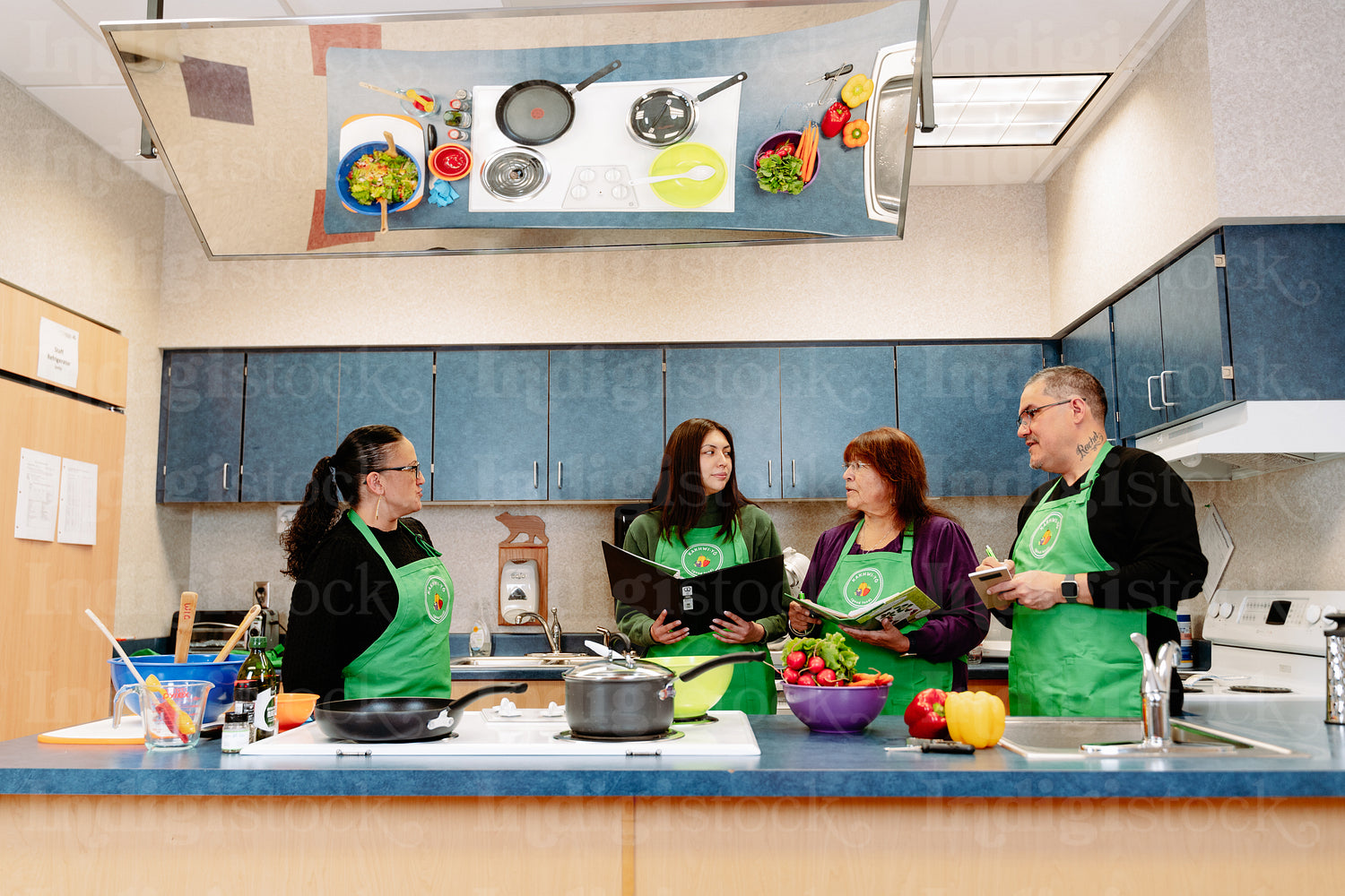 Indigenous Peoples making a meal together