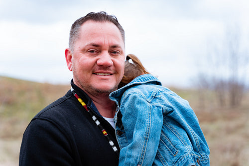 A father and daughter on a walk