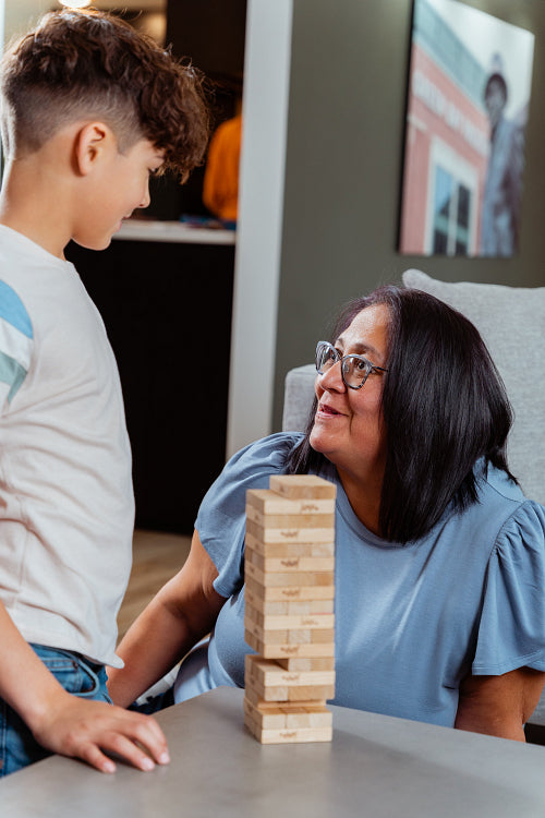 A family of Indigenous Peoples playing games together