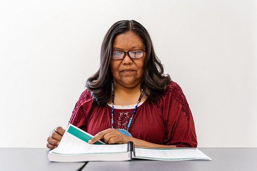 A Native woman learning about health and wellbeing