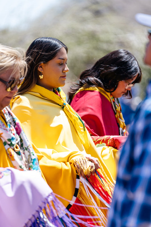 Indigenous Peoples wearing traditional Regalia