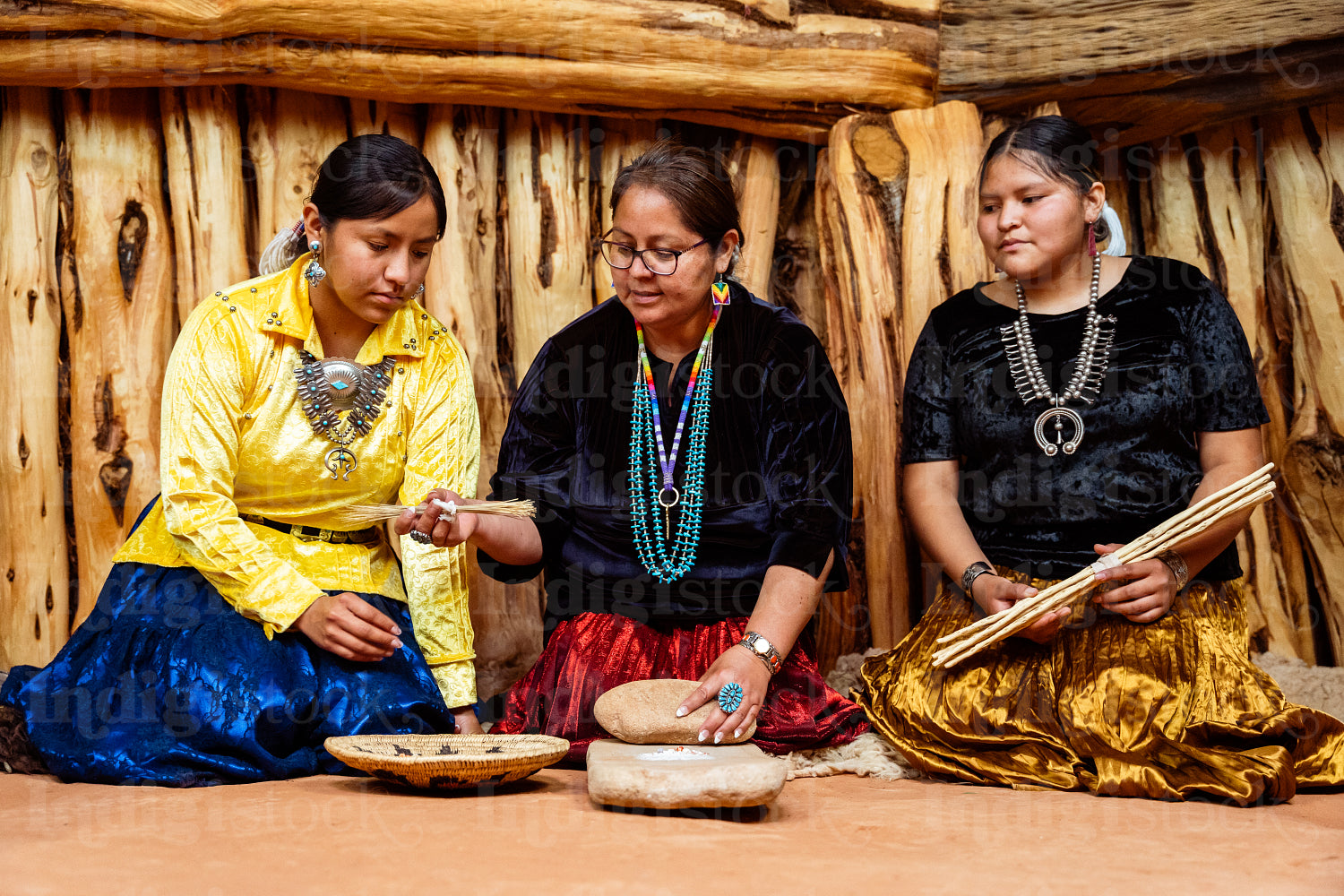 Native Women grinding corn