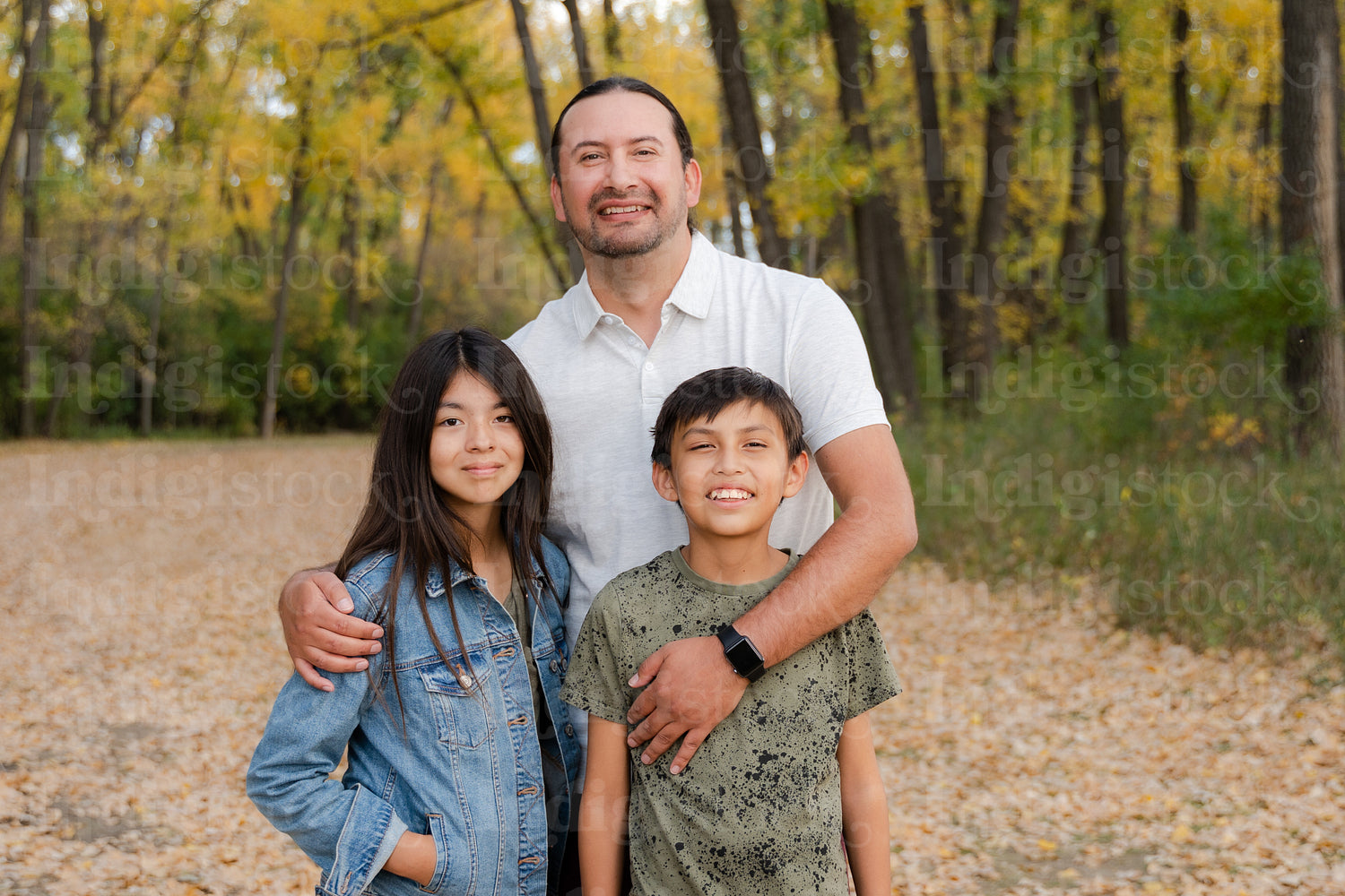 Indigenous family taking a walk in the woods